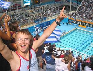 Mosconi takes in action at the aquatics venue during the 2004 Athens Games